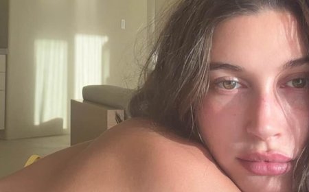 Hailey Bieber puts on a cheeky display in a thong bikini after revealing the secret to her incredible figure