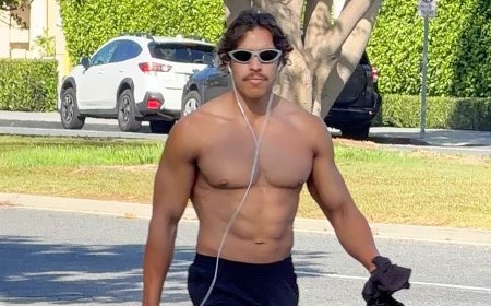 Arnold Schwarzenegger's son Joseph Baena walks shirtless in LA after winning first bodybuilding competition