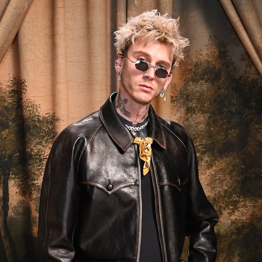 Machine Gun Kelly Reacts After Fan Falls Off Stage During Concert