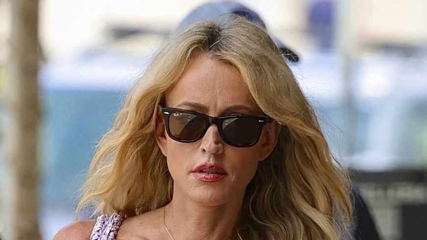 Huge blow for embattled radio stars Kyle and Jackie O - as Henderson cuts a downcast figure on outing in Sydney amid her wrongful termination battle