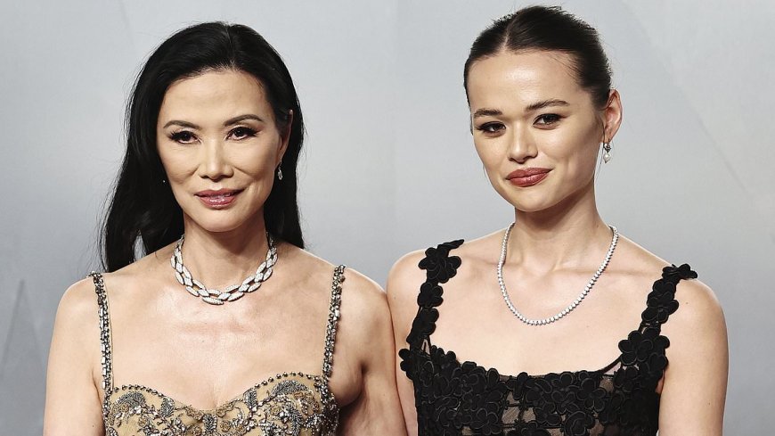 Rupert Murdoch's daughter Grace Deng, 25, stuns in black lace dress and diamond necklace in rare appearance at Oscars with mother Wendi