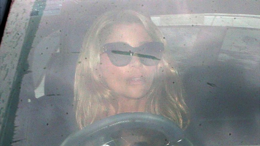 Kyle Sandilands' wife Tegan Kynaston looks tense as she leaves their Vaucluse mansion after the shock jock's bombshell termination