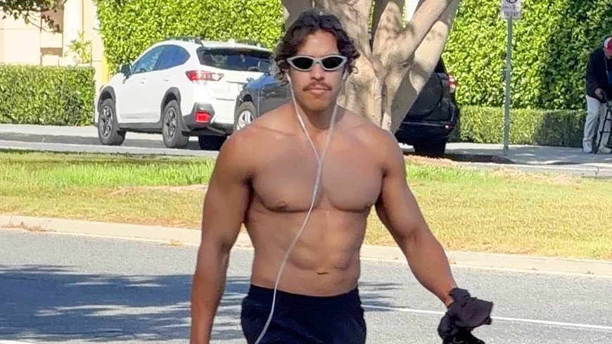 Arnold Schwarzenegger's son Joseph Baena walks shirtless in LA after winning first bodybuilding competition