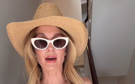 Newly single Millie Mackintosh shows off her toned figure in a white bikini as she pokes fun at the weather in hilarious clip