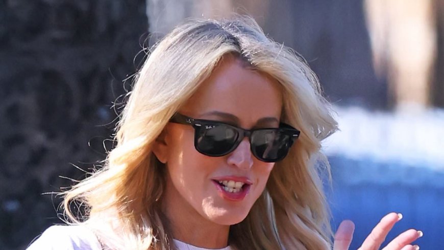 Radio star Jackie 'O' Henderson appears stress free during a relaxed stroll in Sydney's Centennial Park - as court battle continues