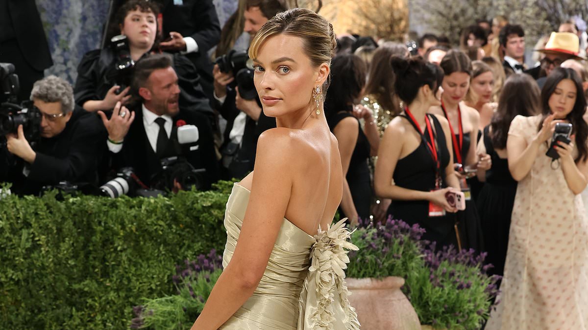 Margot Robbie's Chanel gown is branded 'the biggest disappointment of the Met Gala' before her co-star rushes to her defence