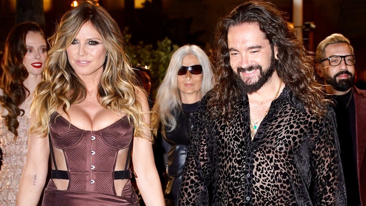 Heidi Klum, 52, shows off her bombshell curves in a low-cut thigh-split gown as she attends Cannes Film Festival event with husband Tom Kaulitz, 36