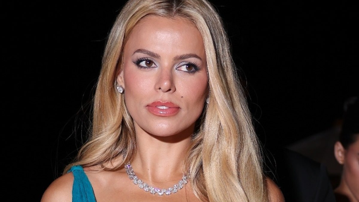 Baywatch bombshell Brooks Nader commands attention in a plunging teal gown as she makes a head-turning appearance in Cannes