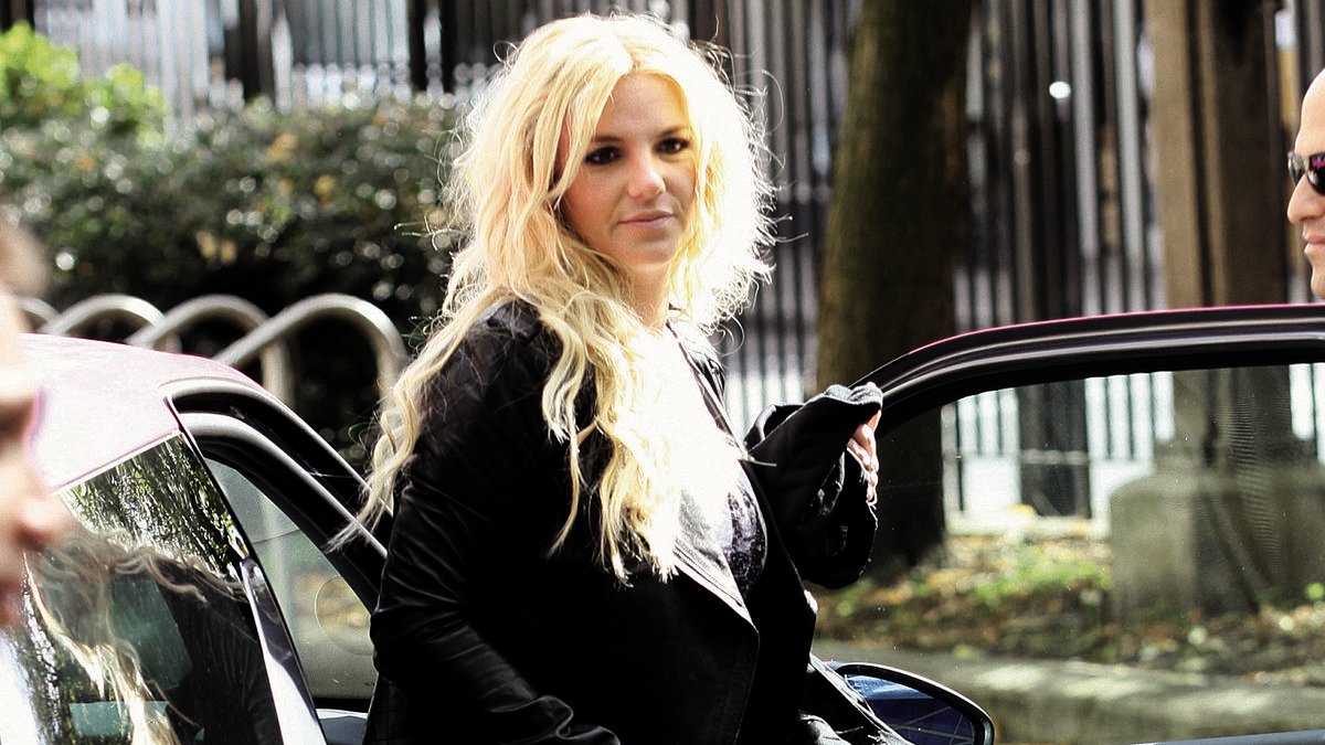 I've photographed the biggest stars in the world. But I'll never forget the moment Britney stormed towards me holding a GUN... or the firestorm that followed