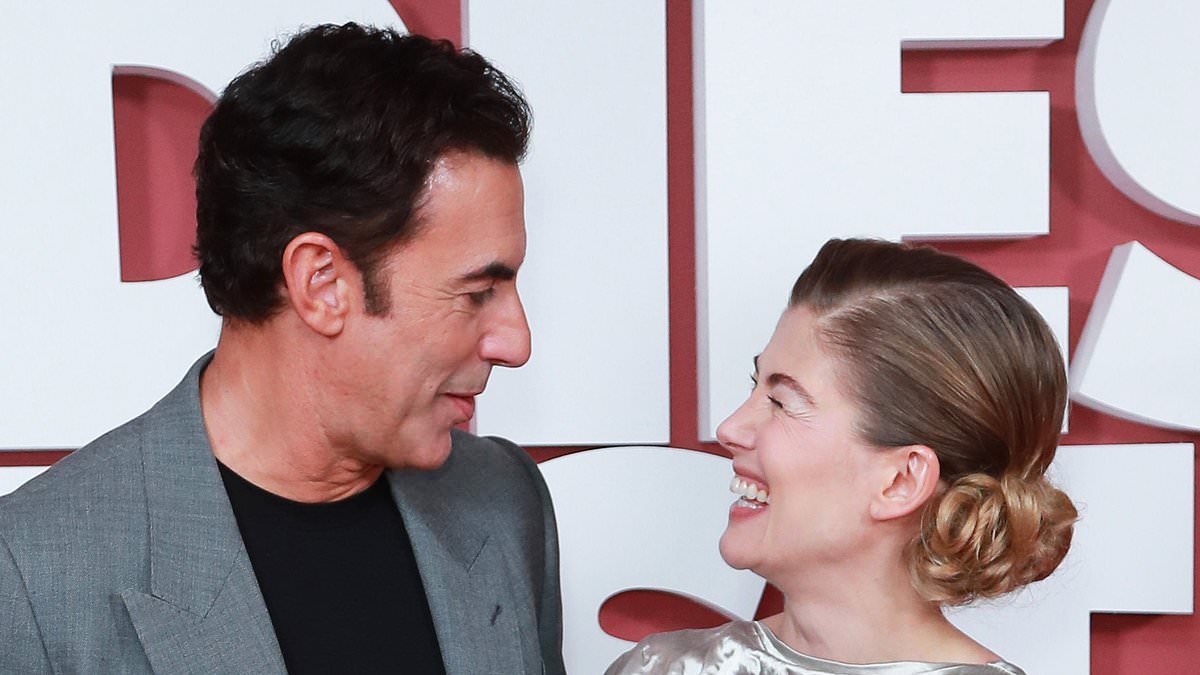 Sacha Baron Cohen teams up with Rosamund Pike to premiere Netflix's gender-reversal rom com... but the movie's first teaser has been labelled 'the worst trailer I've ever seen' by outraged fans