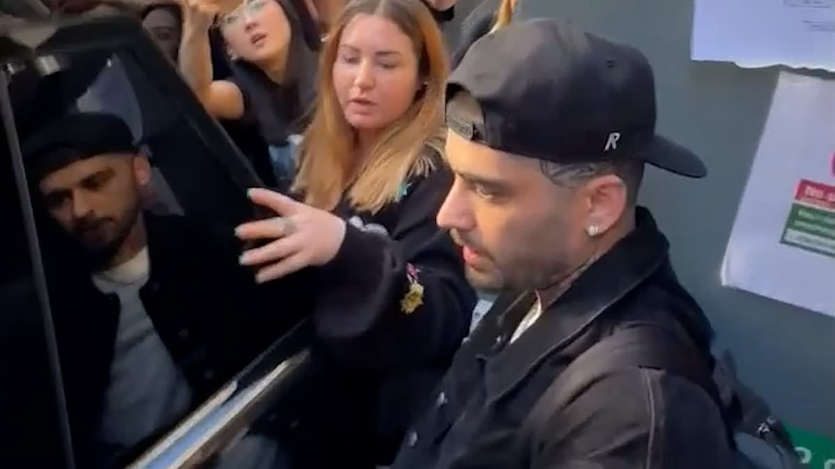 Zayn Malik hits back after he was accused of shouting 'get the f*** out of my way' at fans while leaving Manchester hotel