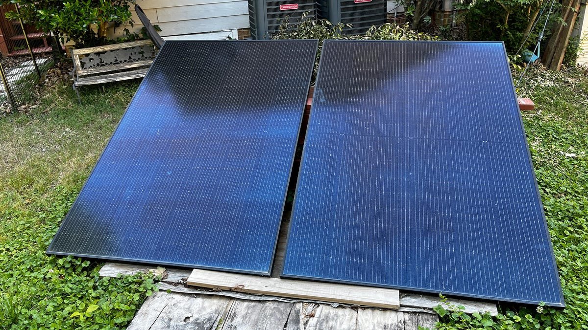 These backyard solar panels saved me $20/mo on my power bill - here's my setup