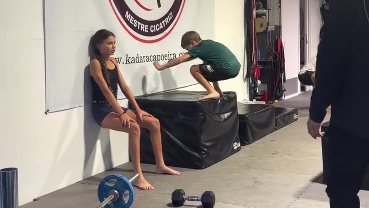 Rachael Finch shares a video of her daughter Violet, 12, doing wall-sits while her son, Dominic, nine, performs box-jumps at the gym