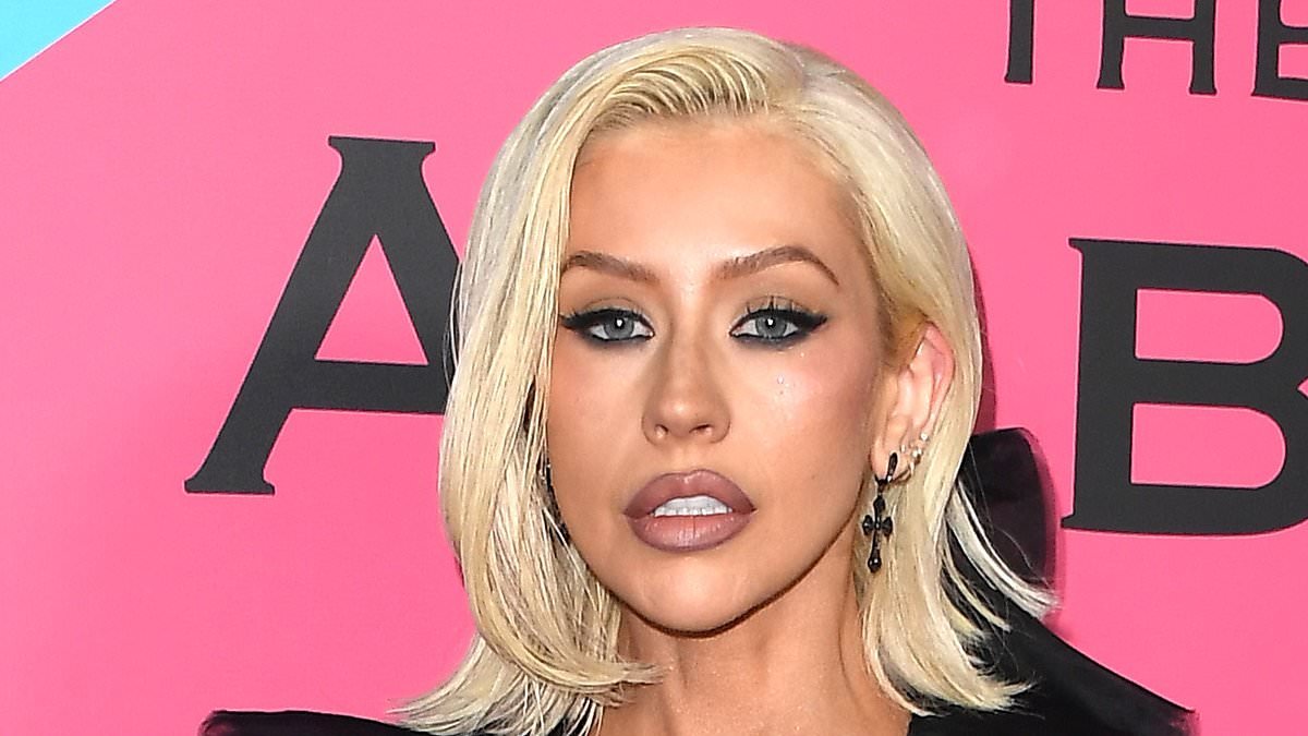 Christina Aguilera looks thinner than ever with a plumper pout alongside youthful Carmen Electra at West Hollywood event