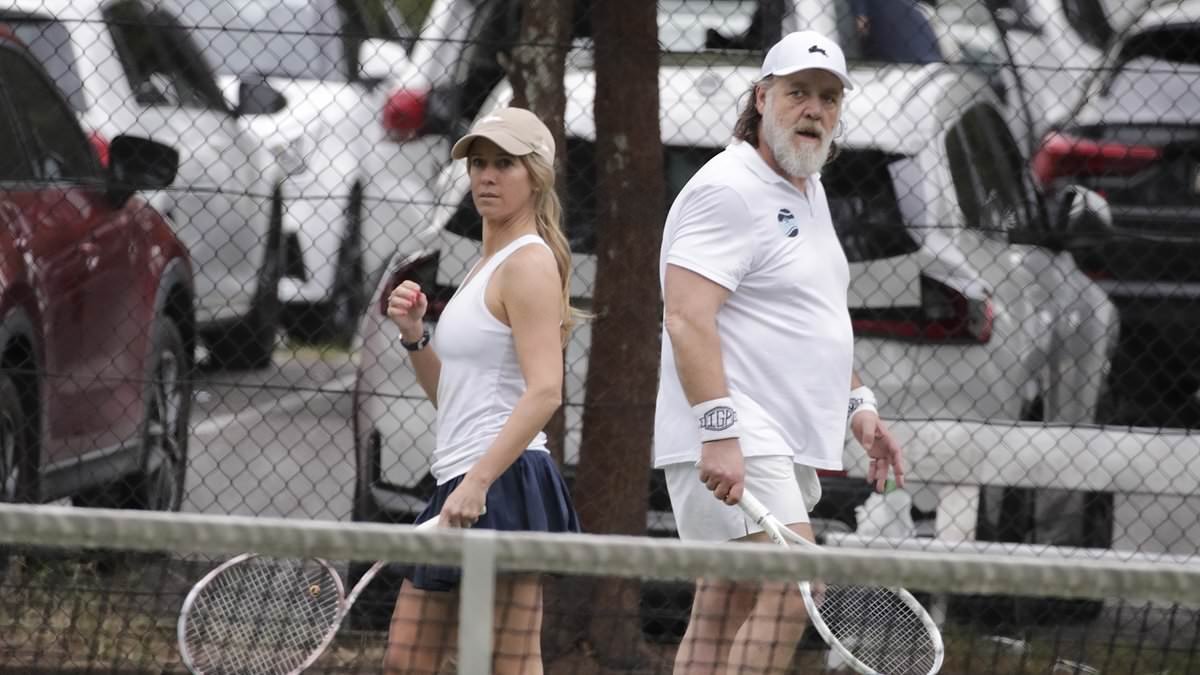 Russell Crowe shows off his 26 kilo weight loss as he enjoys tennis match with stunning partner Britney Theriot in Sydney