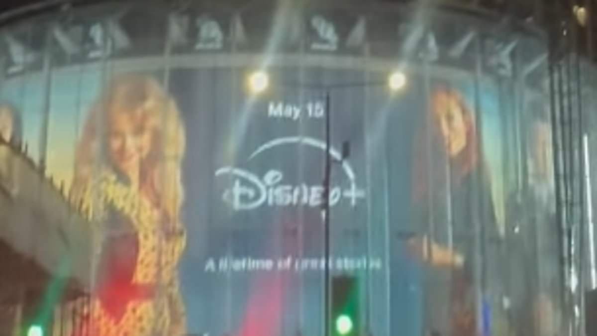 Emily Atack's sister jokes 'she's going to be insufferable' as a HUGE billboard of her Rivals character is erected at London's IMAX