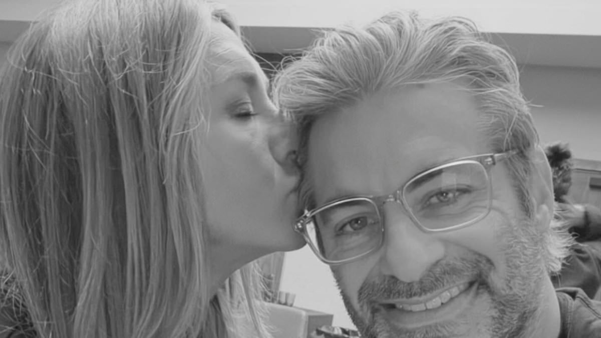 Jennifer Aniston plants kiss on boyfriend Jim Curtis as their one-year anniversary plans are revealed