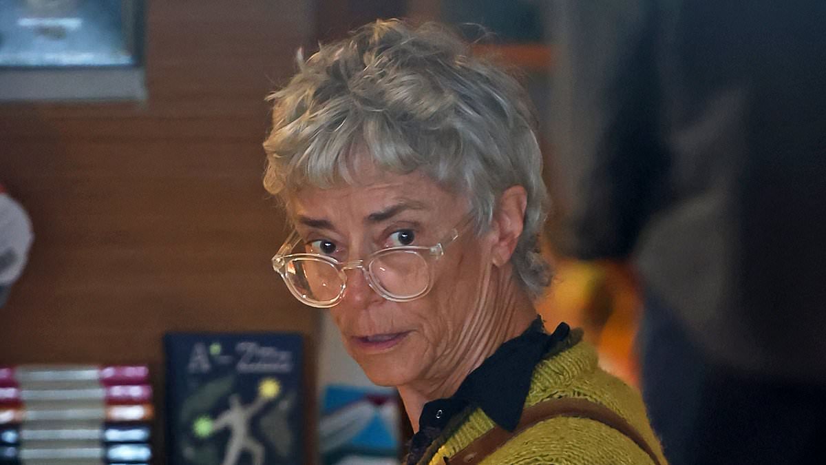 Rare sighting of former sex siren Rachel Ward as she holds a very telling book after lashing back at online firestorm over her grey hair