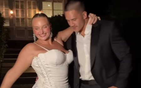Plus-size model who was criticised for her wedding dress reveals her VERY raunchy reception ensemble