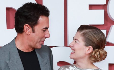 Sacha Baron Cohen teams up with Rosamund Pike to premiere Netflix's gender-reversal rom com... but the movie's first teaser has been labelled 'the worst trailer I've ever seen' by outraged fans