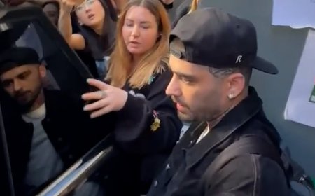 Zayn Malik hits back after he was accused of shouting 'get the f*** out of my way' at fans while leaving Manchester hotel