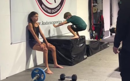 Rachael Finch shares a video of her daughter Violet, 12, doing wall-sits while her son, Dominic, nine, performs box-jumps at the gym