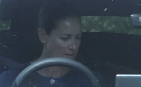 Kirsty Gallacher is seen behind the wheel of her £55,000 Tesla for the first time since serving a six-month driving ban for speeding - her fifth motoring offence in eight years