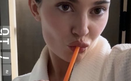 Kylie Jenner flashes washboard abs as she brags about her 12-hour workday