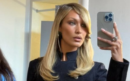 Bella Hadid shows off VERY tiny waist and gives rare glimpse at her model workout routine