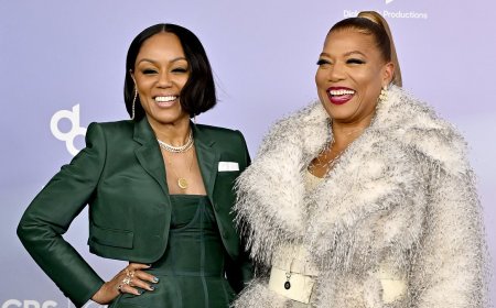 Queen Latifah has rare red carpet appearance with partner Eboni Nichols and son at American Music Awards 2026