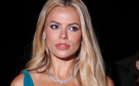 Baywatch bombshell Brooks Nader commands attention in a plunging teal gown as she makes a head-turning appearance in Cannes