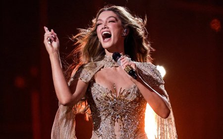 Astounding cost of Delta Goodrem's stunning Eurovision gown revealed - after her crushing defeat