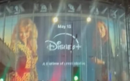 Emily Atack's sister jokes 'she's going to be insufferable' as a HUGE billboard of her Rivals character is erected at London's IMAX
