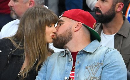Taylor Swift turns heads in a £16,000 designer look as she packs on the PDA with Travis Kelce at a Knicks game