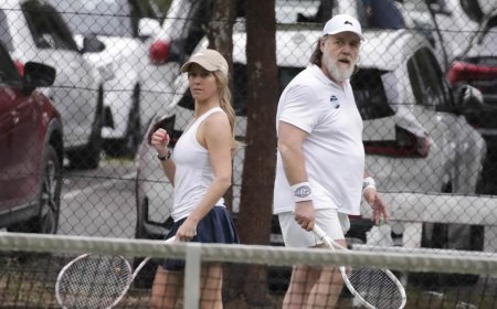Russell Crowe shows off his 26 kilo weight loss as he enjoys tennis match with stunning partner Britney Theriot in Sydney
