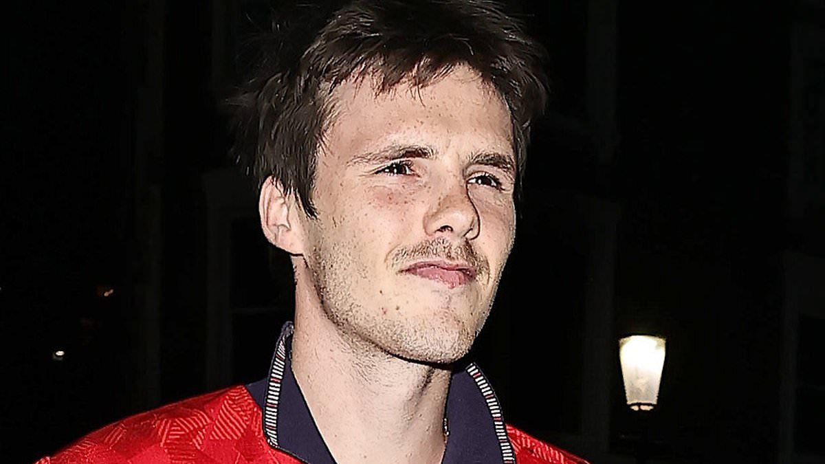 Cruz Beckham takes a subtle swipe at Brooklyn as he pays tribute to dad David's iconic England '7' shirt while partying with Jackie Apostel and an A-list crowd at star-studded World Cup bash