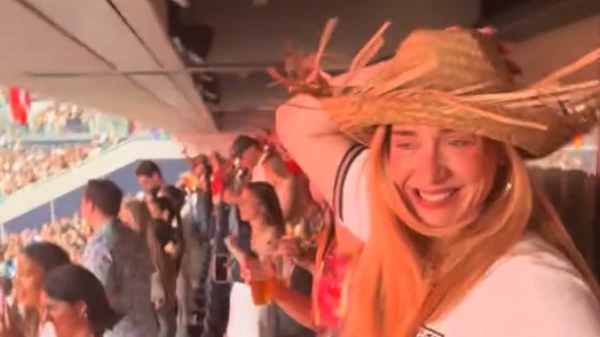 Adele steals fan's hat and shows off her dance moves in an England shirt as she enjoys wild night with Rich Paul at Bad Bunny's star-studded London gig