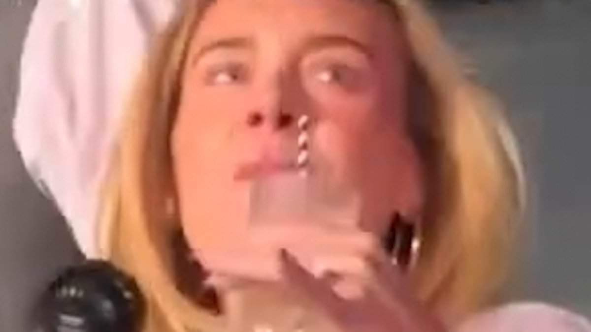 Margot Robbie blends in with concertgoers as she wears a baseball T-shirt and tiny shorts while partying at the Bad Bunny concert in London