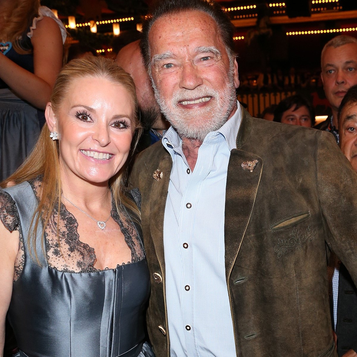 Arnold Schwarzenegger & Heather Milligan Make Rare Appearance