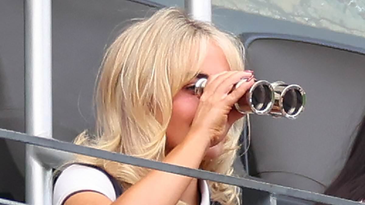 Sabrina Carpenter uses binoculars to see as she makes surprise appearance at Ecuador's thrilling World Cup victory over Germany