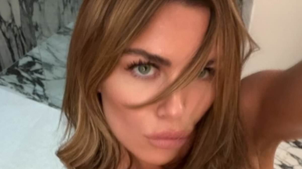 Abbey Clancy, 40, looks incredible as she poses topless for raunchy new bedroom photoshoot