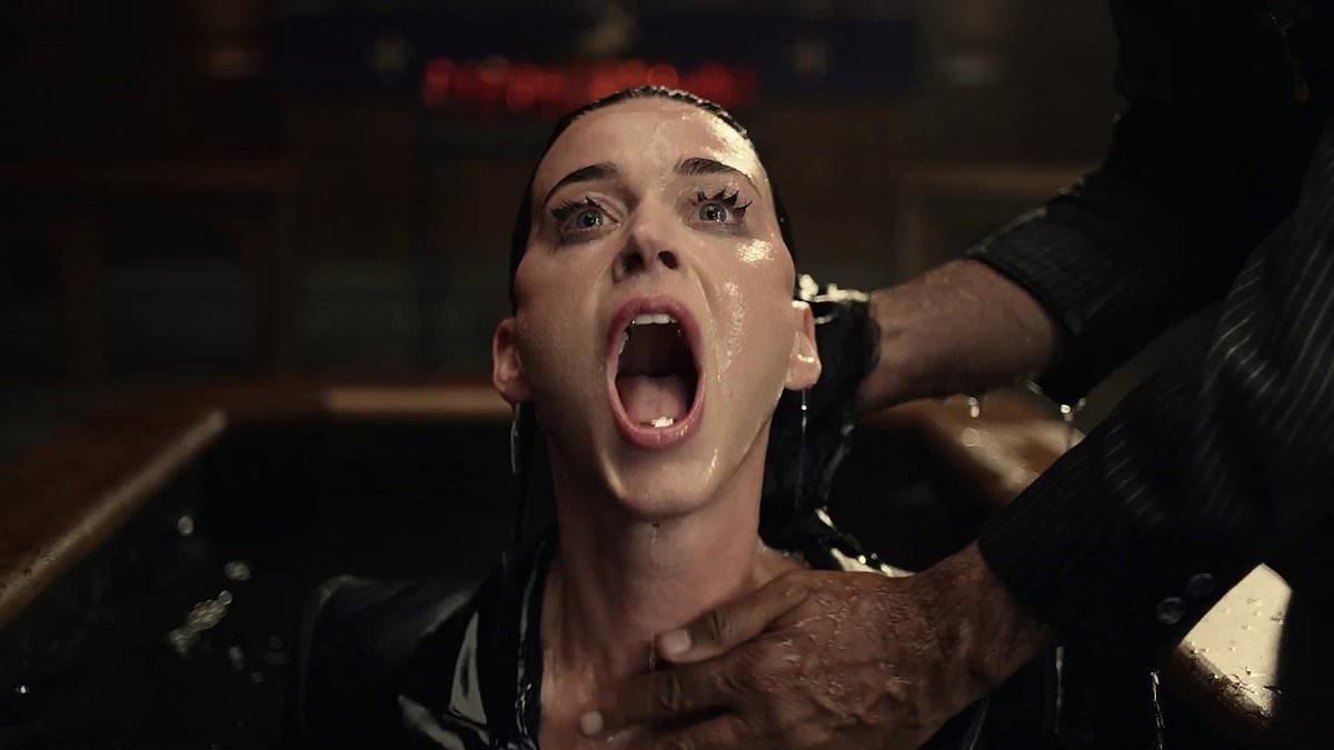 Katy Perry drops 'horrifying' new music video packed with Easter Eggs targeting ex Orlando Bloom as fans herald Watch It Burn as 'a masterpiece' and a return to form for the pop star