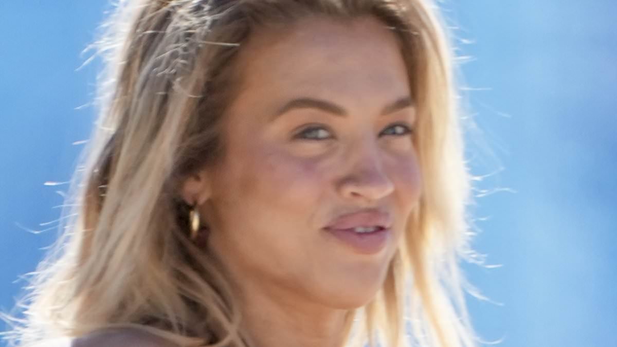 Tammy Hembrow, 32, packs on the PDA with her 'toy boy' boyfriend, 23, on the Gold Coast