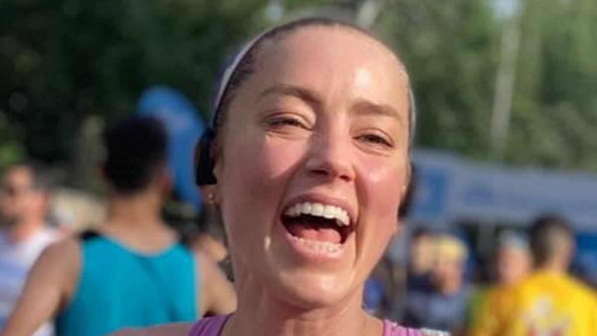 Johnny Depp's ex Amber Heard gives rare glimpse of daughter Oonagh, five, after finishing 10k race in Spain