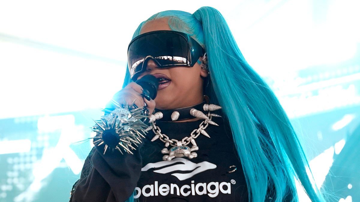 North West, 12, takes the stage in spiked choker and blue pigtails at VERY rowdy music festival… as she gets dad Kanye's stamp of approval