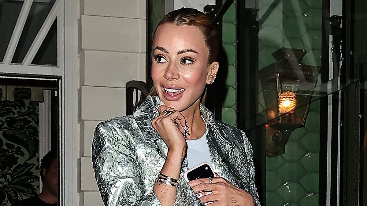 Olivia Attwood accessorises her mini skirt with her favourite £26k designer bag and fun, feathered heels as she joins Nicky Hilton at ALICE + OLIVIA charity fashion dinner