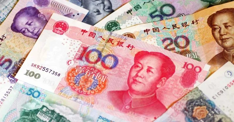 Chinese banks raise dollar deposit rates to counter yuan strength