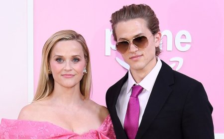 Reese Witherspoon's son Deacon Phillippe, 22, towers over her at the premiere of Legally Blonde prequel Elle