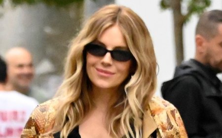 Sienna Miller shows off sparkling new diamond ring in Barcelona - fuelling speculation she is engaged for a fourth time
