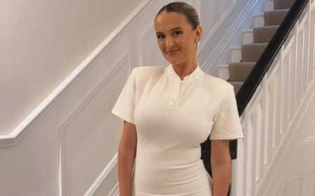 Molly-Mae Hague shows off her post-baby figure just days after welcoming newborn son Midas as Tommy Fury thanks her for 'holding down the fort with our two beautiful children' after victory fight